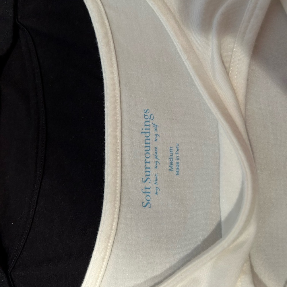 2 Soft Surroundings Sleeveless Tunic with cut out
One black and one white - Picture 4 of 8